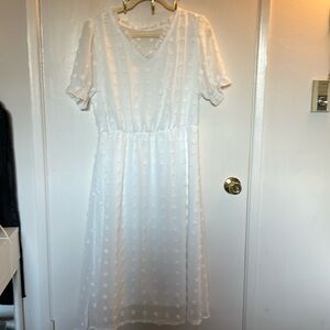 White dotted midi dress with sleeves